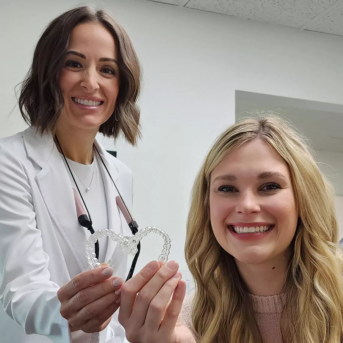 Dr. Traci Leon with an Invisalign patient