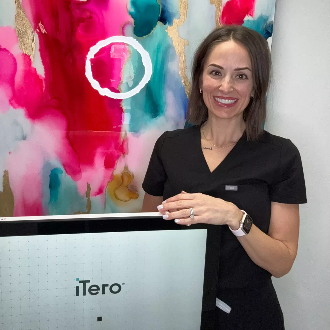 Dr. Traci Leon with iTero technology